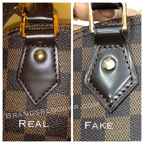 lv alma original vs fake|false louis vuitton alma bags.